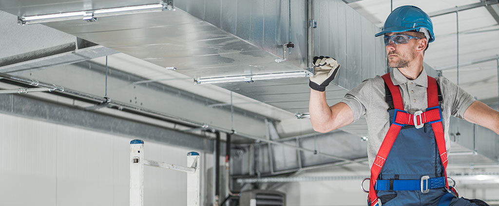 hvac professional checking ducts